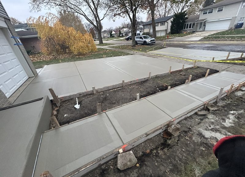 Concrete driveway pour with wood forms still in place