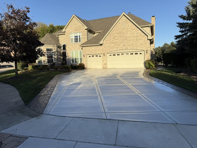 Newly poured concrete driveway with broom finish in Naperville